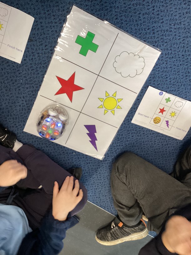 Year 1 doing computing with Bee Bots