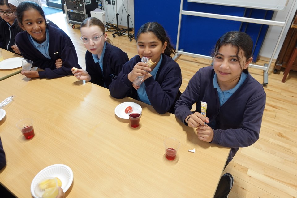 A group of Year 6 children enjoying their SATs breakfast