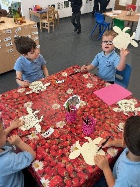 Nursery creating their art work of the Gruffalo