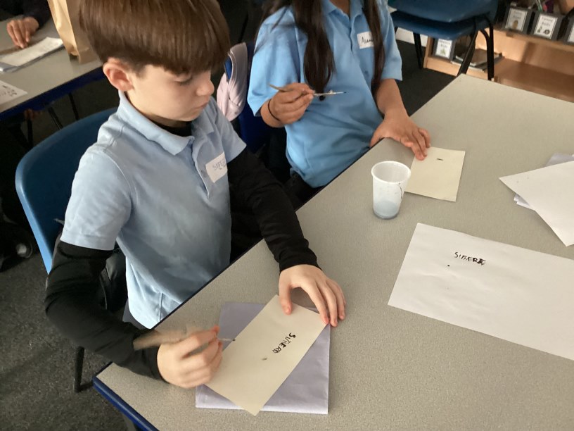 Year 5 writing with a quill and ink