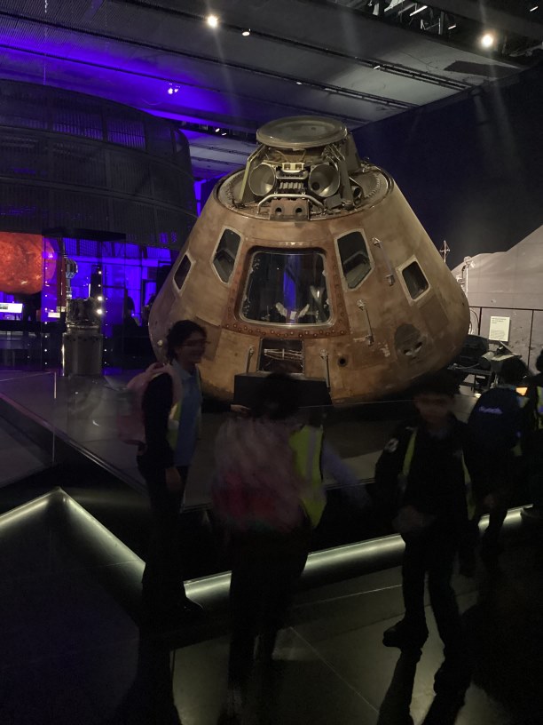 Some year 5 children next to a space capsule